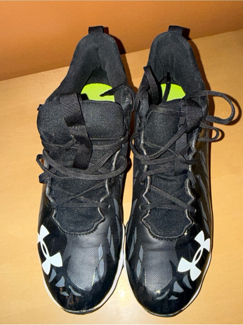 Under Armour Men’s Black Athletic Cleats with White Logo